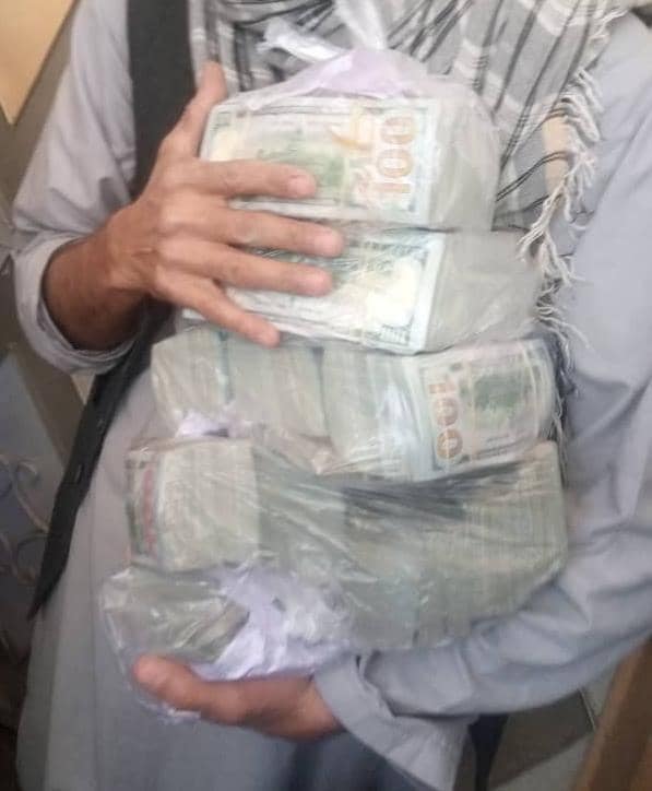 Taliban government officials claim to have arrested a man at Torkham border who was trying to smuggle tens of thousands of USD into Pakistan